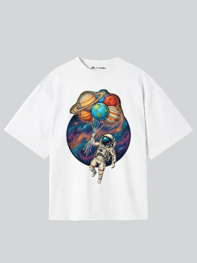 White t-shirt with an astronaut and planet balloons design on a gray background